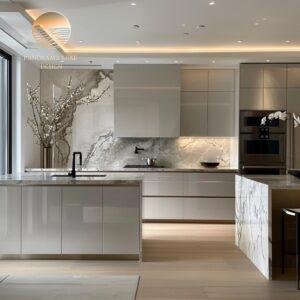 Modern kitchen with glossy beige cabinets, marble surfaces, and under-cabinet lighting.