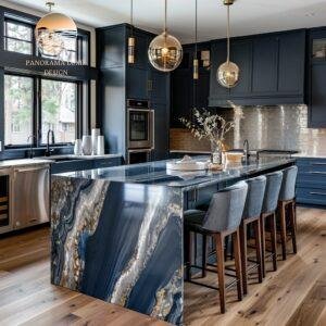 Luxury kitchen featuring a dramatic navy waterfall island with bold gold and silver veining.