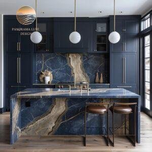 Elegant navy kitchen featuring continuous stone wrapping from island to backsplash in navy and gold.