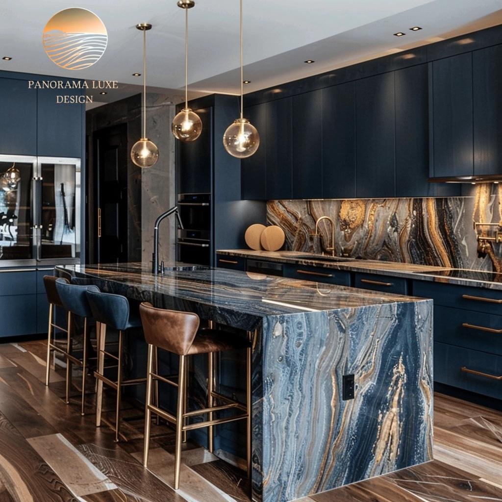 Navy and wood kitchen with polished stone island, dark veining, and gold hardware.