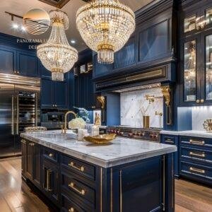 Opulent kitchen with navy cabinetry, white marble island, and ornate gold chandeliers.