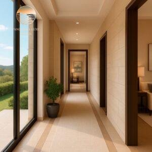 Long corridor with large glass windows and beige walls